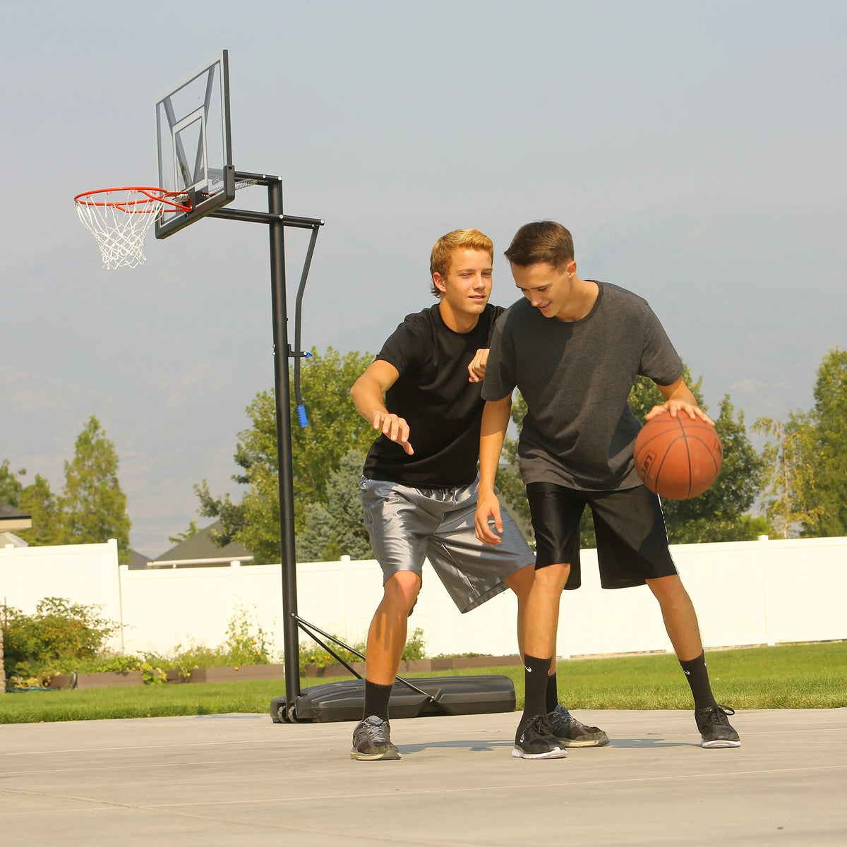 Lifetime 48 - Inch Shatterproof Portable Basketball Hoop with Strong Arm Adjustment & Slam - It Rim - Model 90585 - Outdoor Play